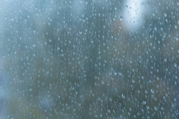 Druppels Regen Een Raam Samenvatting Stedelijke Achtergrond — Stockfoto