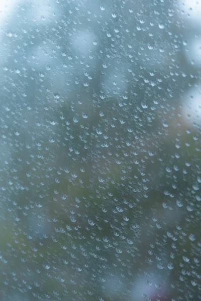 Druppels Regen Een Raam Samenvatting Stedelijke Achtergrond — Stockfoto