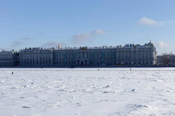 View on Winter Palace, residence of the Emperor of the Russia, from the frozen Neva, winter view of Saint Petersburg, Russia.