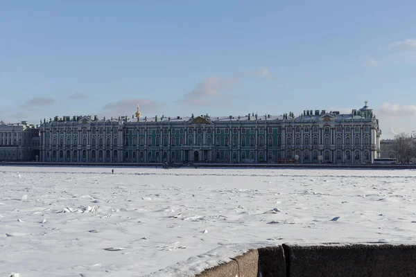 View on Winter Palace, residence of the Emperor of the Russia, from the frozen Neva, winter view of Saint Petersburg, Russia.