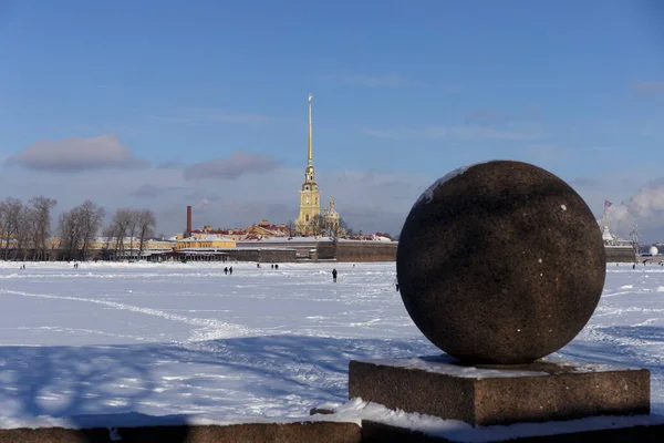 View on Peter and Paul Cathedral, shrine of the Emperor of the Russia, and Peter and Paul fortress, the frozen Neva, winter view of Saint Petersburg, Russia.