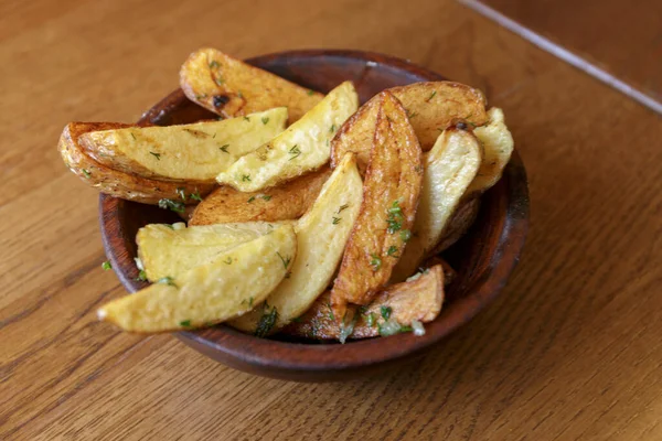 Hot tasty Fried potato slices, culture of American food.