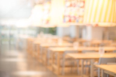 Soyut bulanık Restoran arka plan. Bulanık kafe ya da kafe masa, sandalye ve diğer dekorasyon. Tasarım öğesi için zemin bulanıklık. Yiyecek ve içecek konsepti.