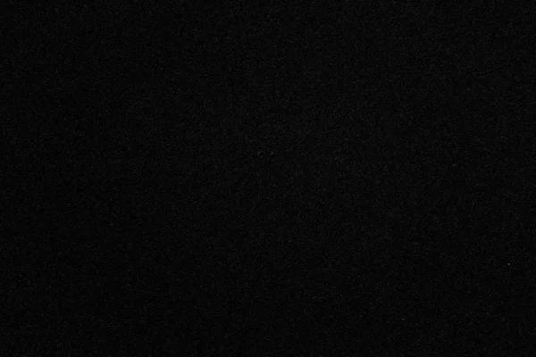 Абстрактный черный зернистый бумажный фон — стоковое фото
