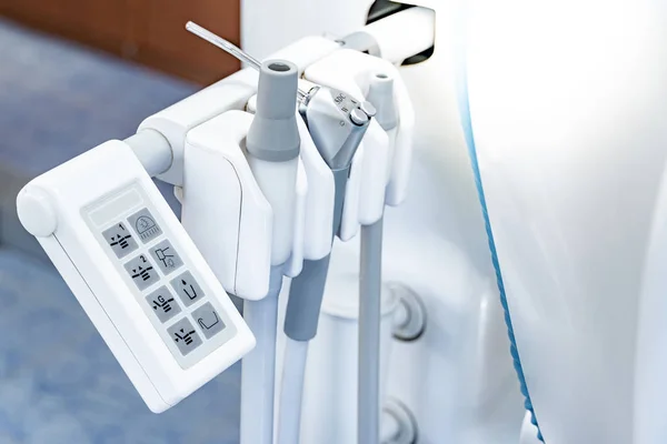 Instruments on dental chair in dentist office — Stock Photo, Image