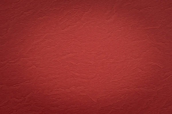 Abstrakte rote faltige Papier Textur Hintergrund — Stockfoto