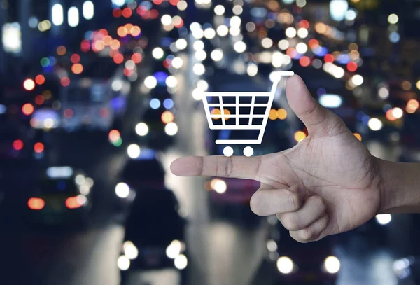 Shopping Cart Icon Finger Blurred Colourful Night Light City Cars — Stock Photo, Image