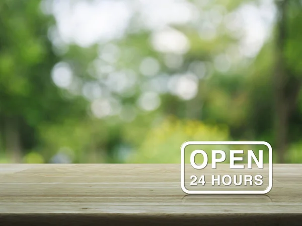 Open Hours Icon Wooden Table Blur Green Tree Background — Stock Photo, Image