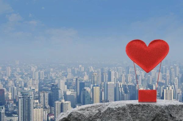 Red Fabric Heart Love Air Balloon Rock Mountain Modern City — Stock Photo, Image