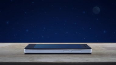 Parkta bulanıkyeşil ağaç üzerinde ahşap masa üzerinde modern akıllı cep telefonu ekranında Taksi araba düz simgesi, İş taşıma hizmeti online kavram