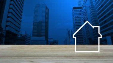 Modern ofis şehir kule ve gökdelen, iş gayrimenkul kavramı üzerinde ahşap masa üzerinde kopya alanı ile ev düz simgesi