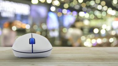 Blur ışık ve alışveriş merkezinin gölgeüzerinde ahşap masa üzerinde kablosuz bilgisayar fare ile Banka düz simgesi, İş bankacılığı online kavramı
