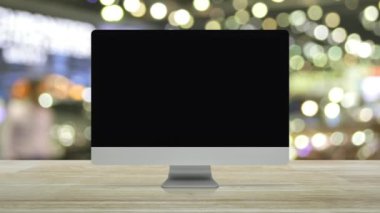 Online alışveriş ile masaüstü modern bilgisayar monitörü grafik depolamak ve açık oturum açma ahşap masa üzerinde ışık ve gölge Alışveriş Merkezi, işyeri internet salonu online kavramı ve bulanıklık