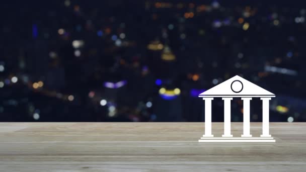 近代的な都市の塔と超高層ビルのカラフルな夜の光の上に木製のテーブルの上に銀行フラットアイコン ビジネスバンキングオンラインコンセプト — ストック動画