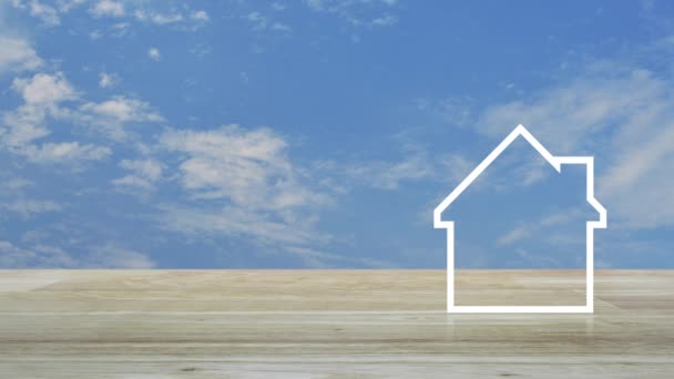 房子平面图标与复制空间在蓝天上的木桌上白云 商业房地产概念 — 图库视频影像