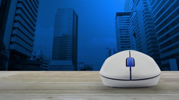 Play movie button with wireless computer mouse on wooden table over modern office city tower and skyscraper, Business cinema online concept