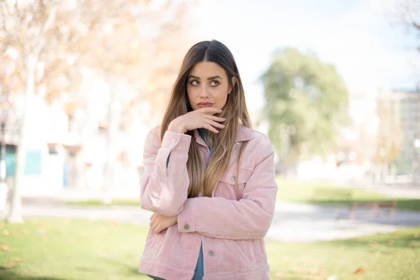 Gloomy Wondering Young Blonde Woman Wearing Pink Jacket Face Looking — Stock Photo, Image