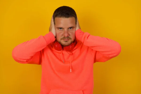 Young Handsome Man Closing Ears Yellow Wall — Stock Photo, Image