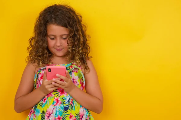 Little Girl Wearing Summer Dress Yellow Background Demonstrating White Teeth — Stock Photo, Image