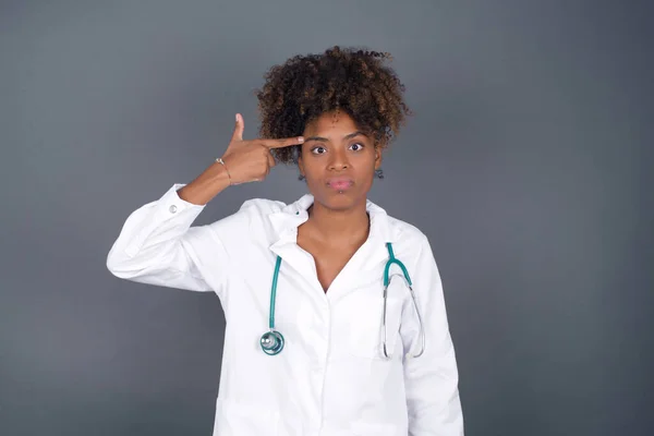 Unhappyafrican American Woman Doctor Curves Lips Makes Suicide Gesture Tired — Stock Photo, Image