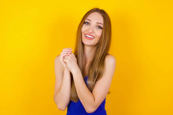 Dreamy Young Woman Pleasant Expression Closes Eyes Keeps Hands Crossed — Stock Photo, Image