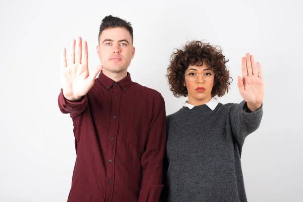 Studio Shot Young Beautiful Couple Showing Stop — Stock Photo, Image