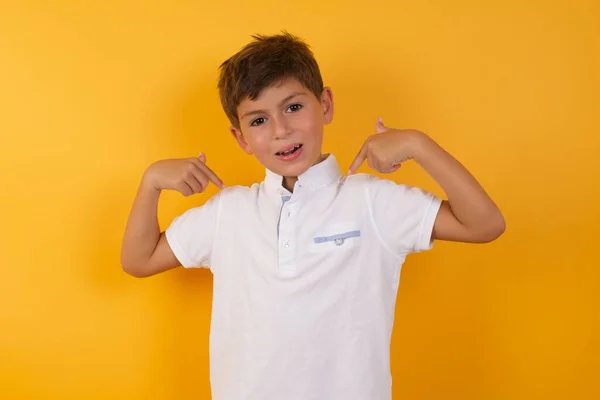 Cute Boy Pointing Himself Yellow Wall — Stock Photo, Image