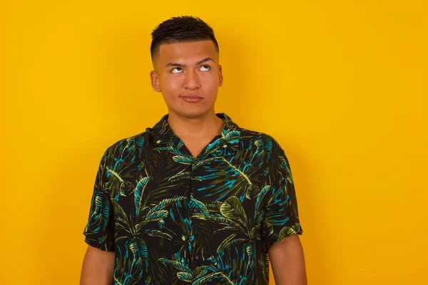 Gloomy Wondering Young Hispanic Man Face Looking Lips Together Being — Stock Photo, Image