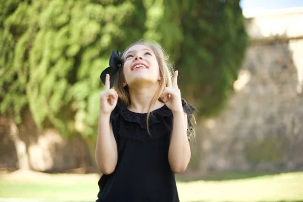 Charming Carefree Cute Girl Black Dress Positive Expression Points Both — Stock Photo, Image