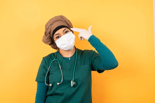 Unhappy Young Beautiful Muslim Doctor Woman Green Medical Uniform Imitates — Stock Photo, Image