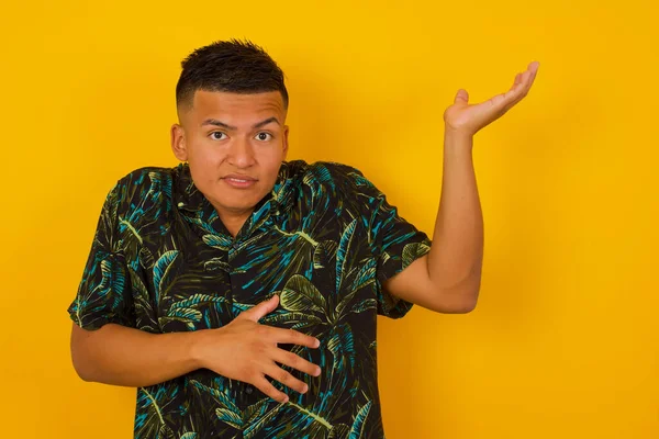 Handsome Hispanic Young Male Pointing Aside Both Hands Showing Something — Stock Photo, Image