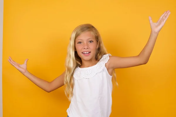 Cute Little Girl Pink Dress Yellow Studio Background Hands — Stock Photo, Image