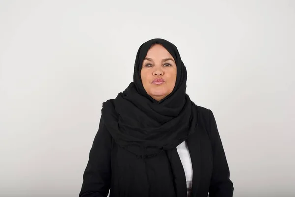 Pleasant Looking Young Muslim Woman Black Hijab Keeps Lips Going — Stock Photo, Image