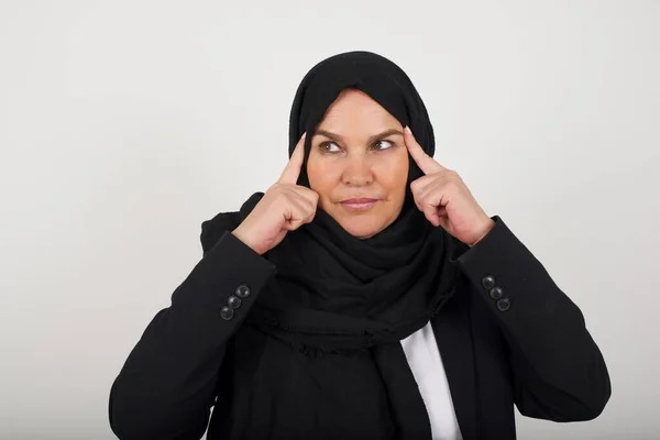 Dreamy Muslim Woman Black Hijab Thoughtful Expression Looks Away Keeps — Stock Photo, Image