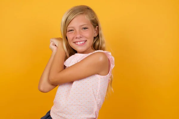 Cute Young Blonde Little Girl Yellow Studio Background Happy — Stock Photo, Image