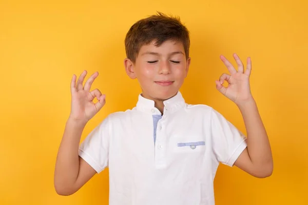 Cute Boy Gestures Yellow Wall — Stock Photo, Image