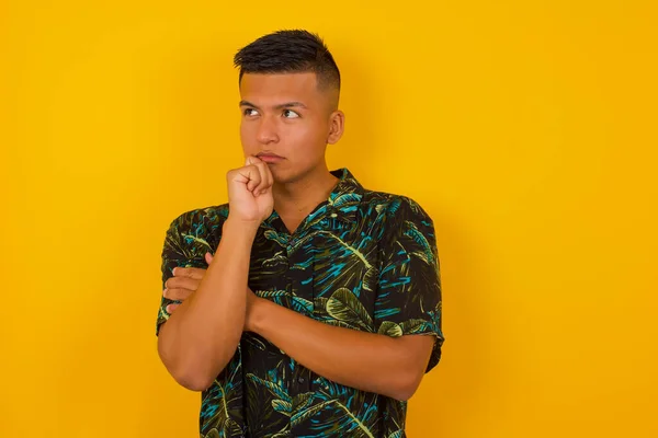 Portrait Thoughtful Hispanic Man Keeps Hand Chin Looks Away Trying — Stock Photo, Image