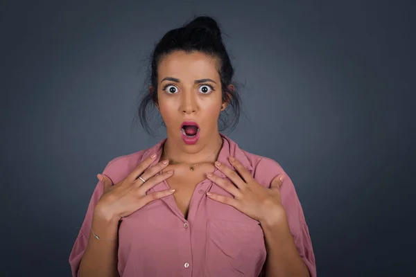 Shocked Beautiful Young Woman Keeps Hands Chest Mouth Widely Opened — Stock Photo, Image