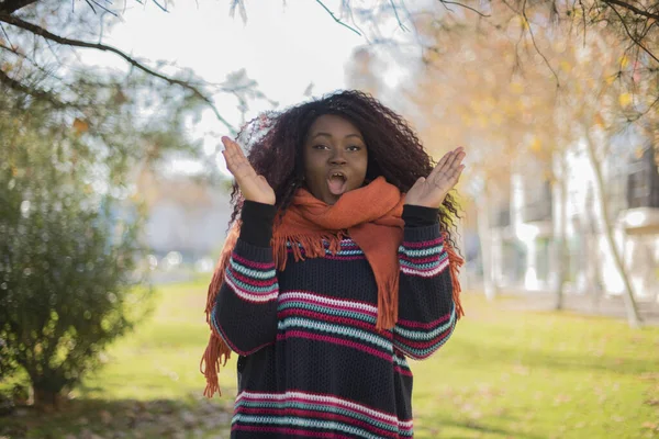 young beautiful woman  is confused    in the park