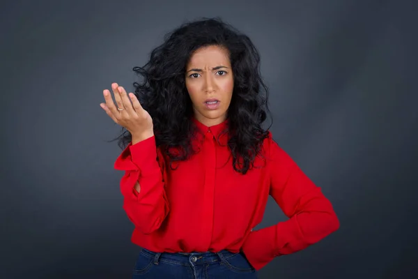 Studio Shot Frustrated Brunette Woman Curly Hair Wearing Red Shirt — Stockfoto