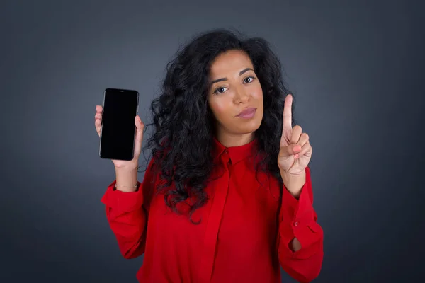 Young Beautiful Brunette Woman Curly Hair Wearing Red Shirt Smartphone — Stock Photo, Image