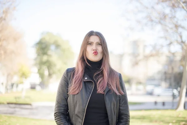 Young Beautiful Caucasian Brunette Woman Making Grimace Wearing Leather Jacket — Stock Photo, Image