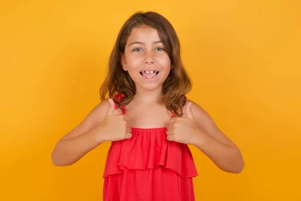 Beautiful Little Girl Wearing Red Dress Thumbs Yellow Background — Stock Photo, Image