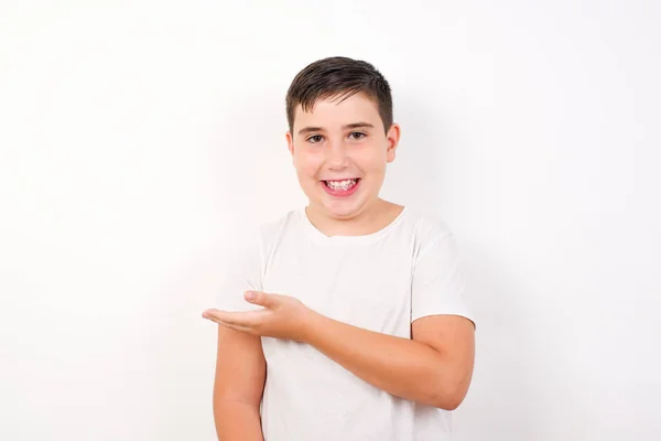 Positive Glad Boy Has Amazed Expression Shows Something Blank Space — Stock Photo, Image