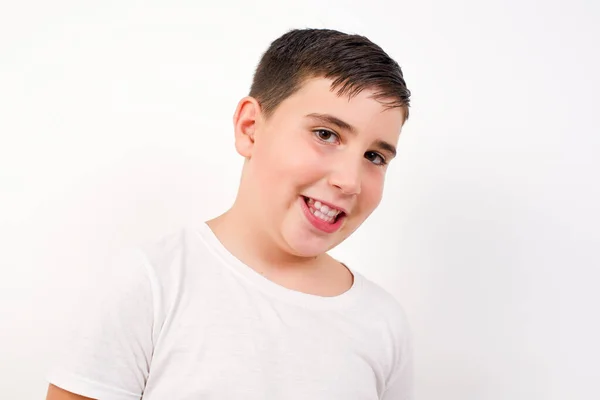 Shy Boy Smiling Looking Camera While Sanding White Studio Background — Stock Photo, Image