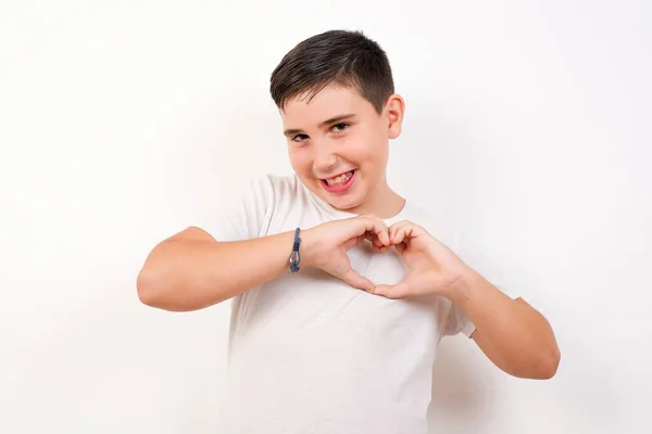Beautiful Caucasian Boy Isolated Background Smiling Love Showing Heart Symbol — Stock Photo, Image