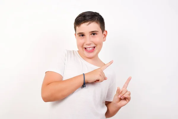 Positive Pretty Caucasian Boy Beaming Smile Shirt White Background Pointing — Stock Photo, Image