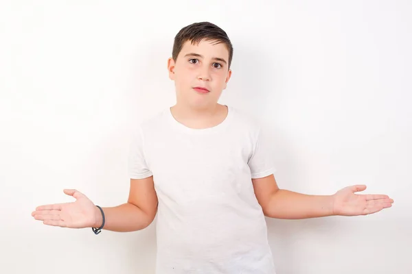 Doubtful Fashionable Boy Shrugs Shoulders Bewilderment Tries Make Decision Puzzled — Stock Photo, Image