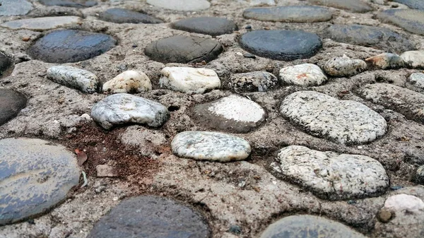 Yol kaldırım taşlarıyla döşenmiş. arkaplan.