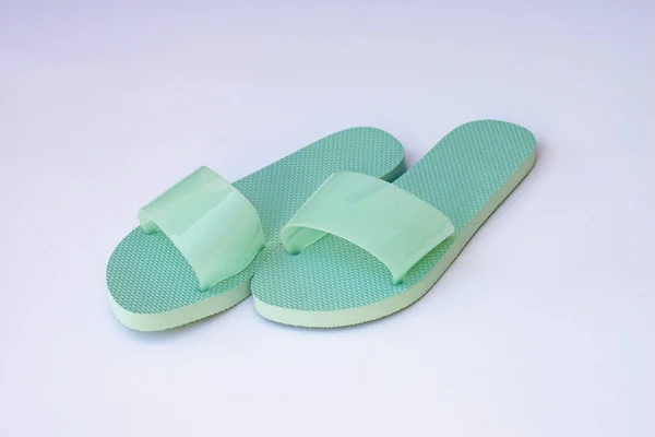 Pair Ground Cheap Durable Green Rubber Slippers Isolated White Background — Stock Photo, Image